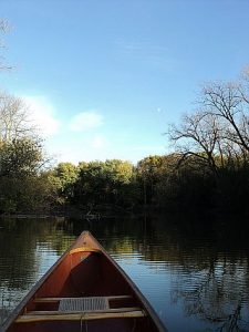 canoe on river by gm