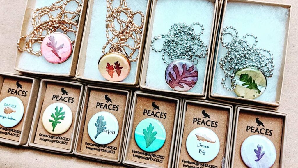 PEACES pendants made from local wildflowers